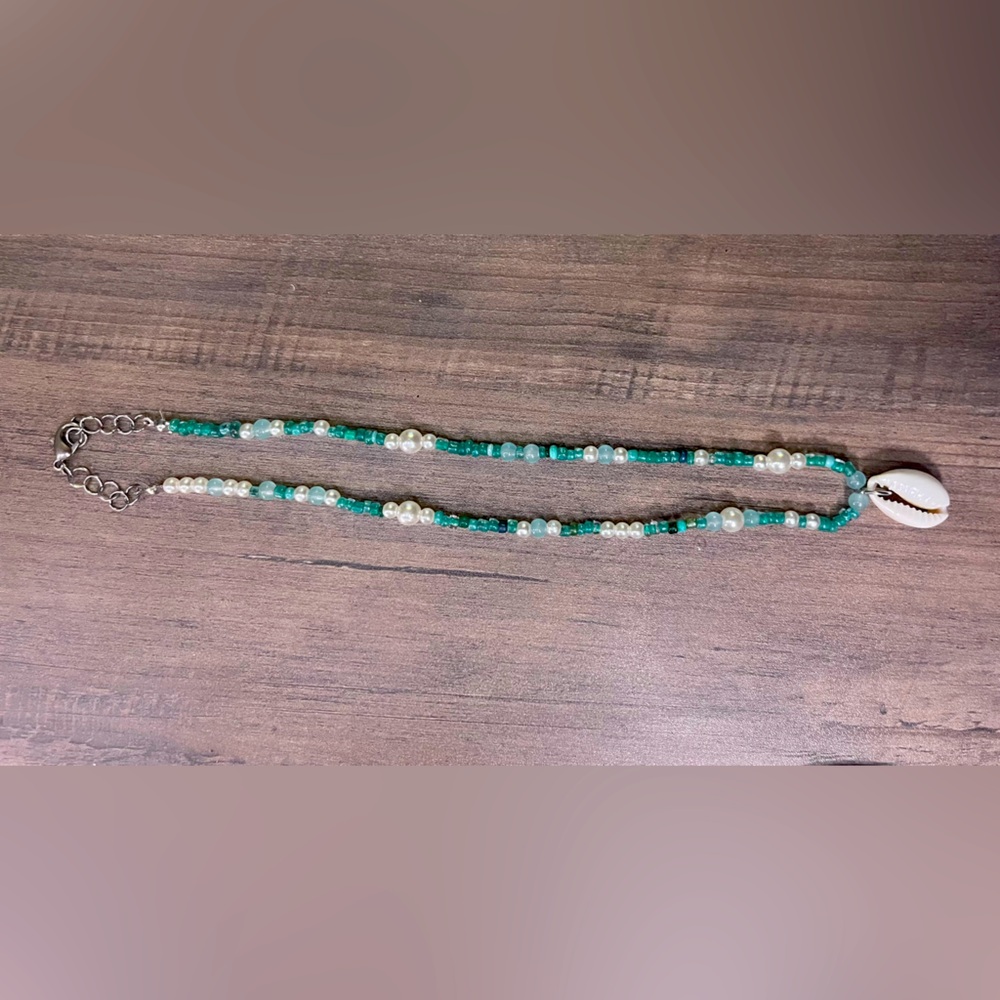 Handmade adjustable seashell necklace with pearls and green beads